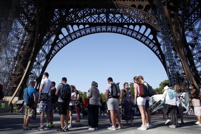 Paris: People queue up prior to visit the Eiffel Tower, in Paris, Thursday, June 25, 2020. (AP) Paris: People queue up prior to visit the Eiffel Tower, in Paris, Thursday, June 25, 2020. (AP)