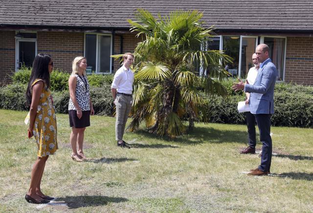Britain's Prince William talks to staff during a visit to the manufacturing laboratory where a vaccine against COVID-19 has been produced, at the Oxford Vaccine Group's facility at the Churchill Hospital in Oxford, England, Wednesday, June 24, 2020. (AP) Britain's Prince William talks to staff during a visit to the manufacturing laboratory where a vaccine against COVID-19 has been produced, at the Oxford Vaccine Group's facility at the Churchill Hospital in Oxford, England, Wednesday, June 24, 2020. (AP)