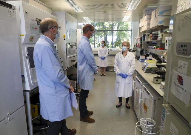 Britain's Prince William, center, wears a mask as he meets scientists during a visit to the manufacturing laboratory where a vaccine against COVID-19 has been produced, at the Oxford Vaccine Group's facility at the Churchill Hospital in Oxford, England, Wednesday, June 24, 2020. (AP) Britain's Prince William, center, wears a mask as he meets scientists during a visit to the manufacturing laboratory where a vaccine against COVID-19 has been produced, at the Oxford Vaccine Group's facility at the Churchill Hospital in Oxford, England, Wednesday, June 24, 2020. (AP)