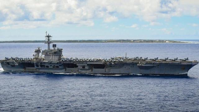 The aircraft carrier USS Theodore Roosevelt (CVN 71) transits near Wake Island, June 26, 2020. The Theodore Roosevelt Carrier Strike Group is on a scheduled deployment to the Indo-Pacific (US Navy Photo) The aircraft carrier USS Theodore Roosevelt (CVN 71) transits near Wake Island, June 26, 2020. The Theodore Roosevelt Carrier Strike Group is on a scheduled deployment to the Indo-Pacific (US Navy Photo)
