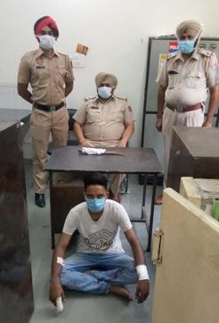 The accused in the custody of Shimlapuri police. He also hurt himself in the attack. (HT Photo)
