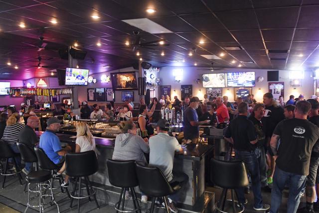 FILE - In this Thursday, June 18, 2020, file photo, patrons fill the Crow Bar in Sioux Falls, S.D. (AP) FILE - In this Thursday, June 18, 2020, file photo, patrons fill the Crow Bar in Sioux Falls, S.D. (AP)