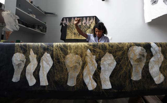 German-Ghanaian artist Zohra Opoku works on her project at Kehinde Wiley's artist residence during the interview in Dakar, Senegal on June 29, 2020. (REUTERS/Zohra Bensemra) German-Ghanaian artist Zohra Opoku works on her project at Kehinde Wiley's artist residence during the interview in Dakar, Senegal on June 29, 2020. (REUTERS/Zohra Bensemra)