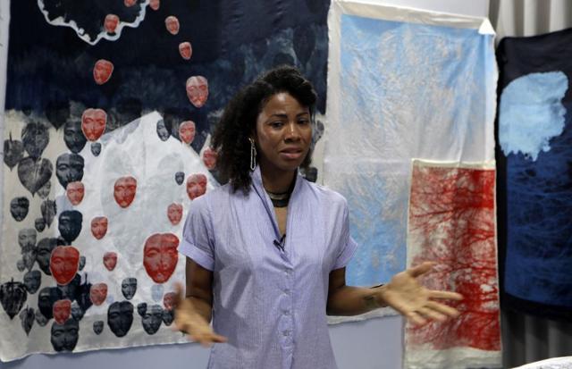 German-Ghanaian artist Zohra Opoku reacts in front of her project at Kehinde Wiley's artist residence during the interview in Dakar, Senegal on June 29, 2020. (REUTERS/Zohra Bensemra) German-Ghanaian artist Zohra Opoku reacts in front of her project at Kehinde Wiley's artist residence during the interview in Dakar, Senegal on June 29, 2020. (REUTERS/Zohra Bensemra)
