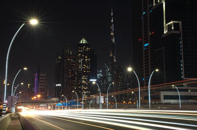 In this photo taken with a slow shutter speed, traffic speeds down the Sheikh Zayed Road in Dubai, United Arab Emirates, Monday, July 6, 2020. (AP) In this photo taken with a slow shutter speed, traffic speeds down the Sheikh Zayed Road in Dubai, United Arab Emirates, Monday, July 6, 2020. (AP)
