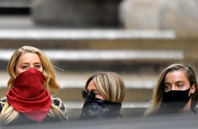 Actor Amber Heard leaves the High Court in London. (REUTERS) Actor Amber Heard leaves the High Court in London. (REUTERS)