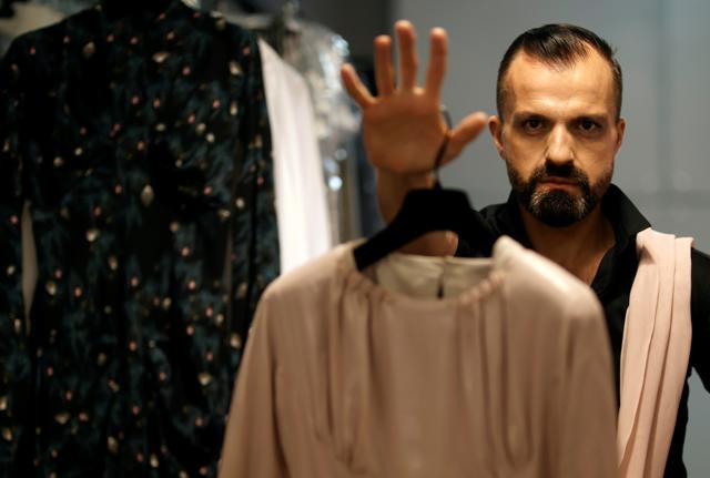 French designer Julien Fournie poses during an interview with Reuters at his workshop ahead of his Haute Couture Online Fall/Winter 2020/2021 collection presentation in Paris, France, July 3, 2020. (REUTERS) French designer Julien Fournie poses during an interview with Reuters at his workshop ahead of his Haute Couture Online Fall/Winter 2020/2021 collection presentation in Paris, France, July 3, 2020. (REUTERS)