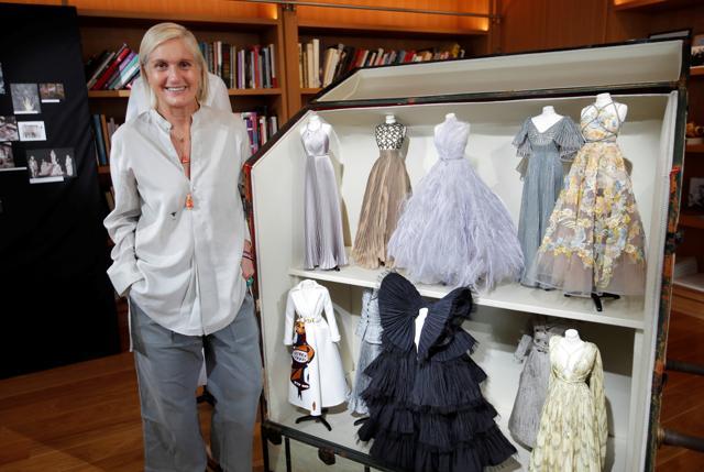 Maria Grazia Chiuri, designer for fashion house Dior, poses next to her creations on miniature mannequins ahead of the Paris Haute Couture week, Paris, France, July 4, 2020. (REUTERS) Maria Grazia Chiuri, designer for fashion house Dior, poses next to her creations on miniature mannequins ahead of the Paris Haute Couture week, Paris, France, July 4, 2020. (REUTERS)