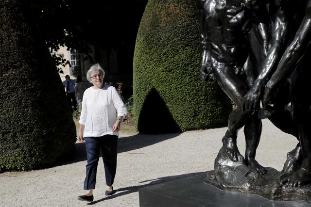 Rodin museum director Catherine Chevillot poses in the garden of Rodin museum in Paris Tuesday, July 7, 2020. The Musee Rodin is reopening this morning albeit with a worrying loss of visitors and income caused by the four-months closure. Catherine Chevillot, estimates the loss incurred by the crisis to be around 4.4 million euros (4.9 US dollars) and alleviated by the 1.4 million euro sales of bronze editions of Rodin statues. The museum doesn't sell Rodin statue originals but can sell 12 bronze replica editions of each of them, as it has been for 100 years. (AP) Rodin museum director Catherine Chevillot poses in the garden of Rodin museum in Paris Tuesday, July 7, 2020. The Musee Rodin is reopening this morning albeit with a worrying loss of visitors and income caused by the four-months closure. Catherine Chevillot, estimates the loss incurred by the crisis to be around 4.4 million euros (4.9 US dollars) and alleviated by the 1.4 million euro sales of bronze editions of Rodin statues. The museum doesn't sell Rodin statue originals but can sell 12 bronze replica editions of each of them, as it has been for 100 years. (AP)