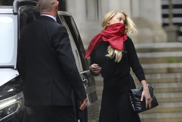 Amber Heard departs the High Court in London, Wednesday, July 8, 2020. (AP) Amber Heard departs the High Court in London, Wednesday, July 8, 2020. (AP)