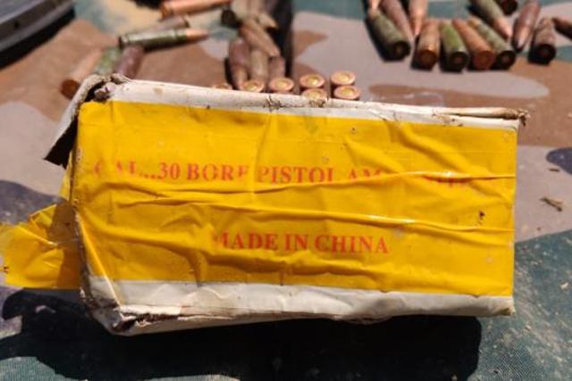 A Chinese pistol along with two magazines and 36 rounds of ammunition was also seized A Chinese pistol along with two magazines and 36 rounds of ammunition was also seized