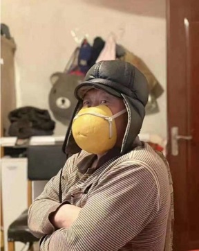 Man wearing melon shell as mask (Screengrab ) Man wearing melon shell as mask (Screengrab )