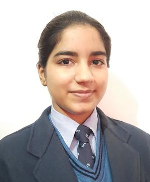 Harpreet Kaur Gill of Doon International School, Sector 69, scored 97% in the medical stream (HT photo)