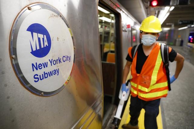 Contractors clean subway cars at the 96th Street station to control the spread of COVID-19, Thursday, July 2, 2020, in New York. (AP) Contractors clean subway cars at the 96th Street station to control the spread of COVID-19, Thursday, July 2, 2020, in New York. (AP)
