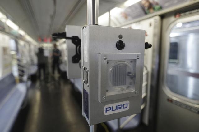FILE - In this May 19, 2020, file photo, a UV-C lighting device to be used to disinfect trains and buses during the coronavirus pandemic is shown on a subway car at the MTA Corona Maintenance Facility in the Queens borough of New York. (AP) FILE - In this May 19, 2020, file photo, a UV-C lighting device to be used to disinfect trains and buses during the coronavirus pandemic is shown on a subway car at the MTA Corona Maintenance Facility in the Queens borough of New York. (AP)