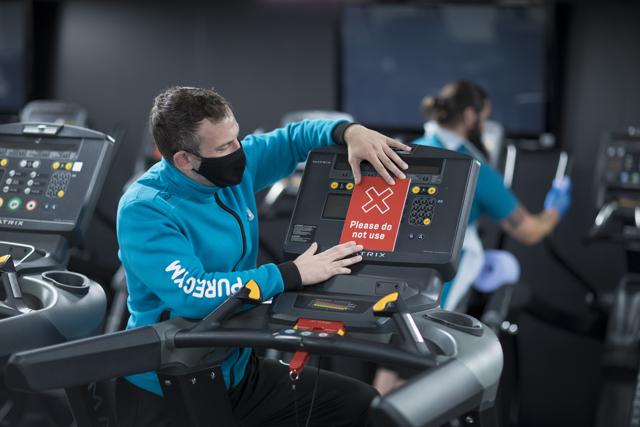 An employee places a 'please do not use' notice on a treadmill at a Pure Gym Group Plc health club, as they prepare for reopening from July 25, in the City of London, U.K., on Monday, July 20, 2020. (Representational) (Bloomberg) An employee places a 'please do not use' notice on a treadmill at a Pure Gym Group Plc health club, as they prepare for reopening from July 25, in the City of London, U.K., on Monday, July 20, 2020. (Representational) (Bloomberg)