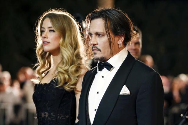 Johnny Depp and Amber Heard in a file photo. (REUTERS) Johnny Depp and Amber Heard in a file photo. (REUTERS)