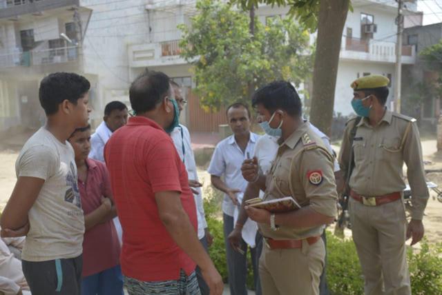 Police interacting with the people in the area. Police interacting with the people in the area.