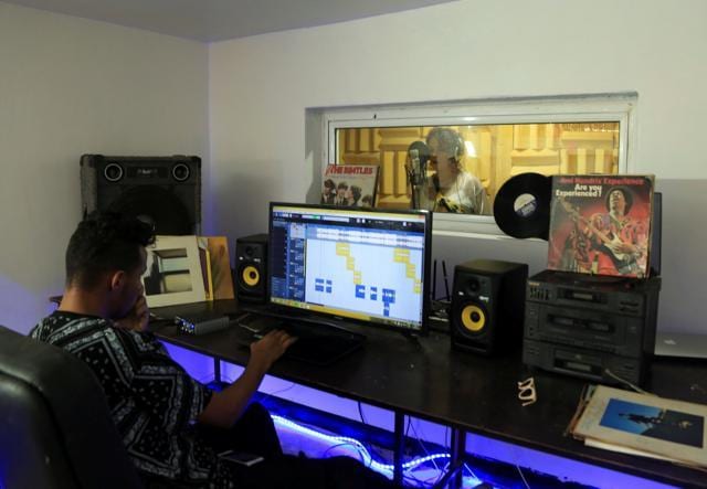 Moroccan rapper Houda Abouz, 24, known by her stage name "Khtek", records a song inside a studio in Rabat, Morocco July 20, 2020. (REUTERS/Shereen Talaat) Moroccan rapper Houda Abouz, 24, known by her stage name "Khtek", records a song inside a studio in Rabat, Morocco July 20, 2020. (REUTERS/Shereen Talaat)