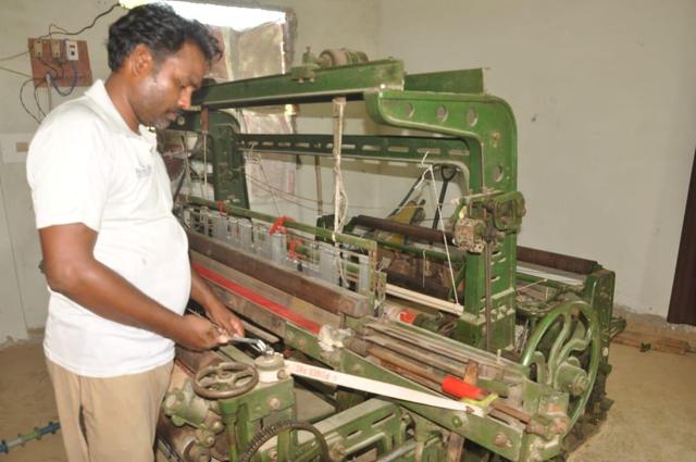 A weaver at his powerloom. (HT photo by Rajesh Kumar) A weaver at his powerloom. (HT photo by Rajesh Kumar)