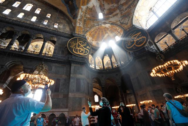 People take pictures as they visit Hagia Sophia Grand Mosque in Istanbul, Turkey, July 26, 2020. (REUTERS) People take pictures as they visit Hagia Sophia Grand Mosque in Istanbul, Turkey, July 26, 2020. (REUTERS)