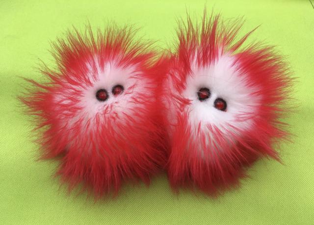 This image released by Amy Micallef shows plush toy representations of COVID-19. Micallef, a Broadway seamstress who has worked in the wardrobe departments of “Hamilton,” “Waitress” and “Frozen,” sells the toys as her side hustle, while Broadway productions are closed due to the pandemic. (AP) This image released by Amy Micallef shows plush toy representations of COVID-19. Micallef, a Broadway seamstress who has worked in the wardrobe departments of “Hamilton,” “Waitress” and “Frozen,” sells the toys as her side hustle, while Broadway productions are closed due to the pandemic. (AP)