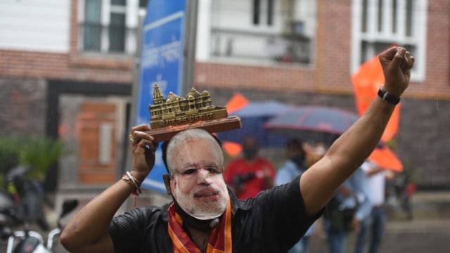 A devotee celebrating on the ocassion of Ram temple bhoomi pujan in Ayodhya. (Sonu Mehta/HT) A devotee celebrating on the ocassion of Ram temple bhoomi pujan in Ayodhya. (Sonu Mehta/HT)