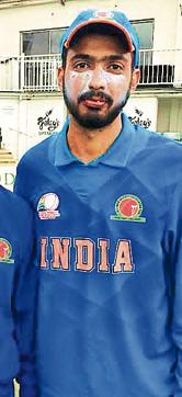 Amir Hussain Rather is a left arm fast bowler. He was only four months old when four fingers of his right hand had to be amputated after he suffered burns (HT Photo ) Amir Hussain Rather is a left arm fast bowler. He was only four months old when four fingers of his right hand had to be amputated after he suffered burns (HT Photo )