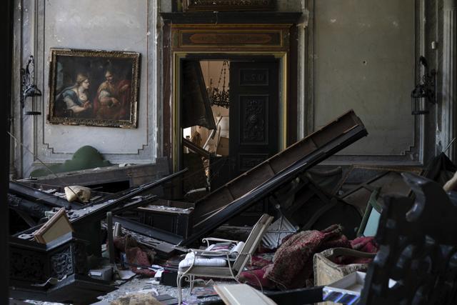 A painting hangs on the wall of a heavily damaged room in the Sursock Palace after the explosion in the seaport of Beirut, Lebanon, Saturday, Aug. 8, 2020. The level of destruction from the massive explosion at Beirut's port last week is ten times worse than what 15 years of civil war did. (AP Photo/Felipe Dana) A painting hangs on the wall of a heavily damaged room in the Sursock Palace after the explosion in the seaport of Beirut, Lebanon, Saturday, Aug. 8, 2020. The level of destruction from the massive explosion at Beirut's port last week is ten times worse than what 15 years of civil war did. (AP Photo/Felipe Dana)