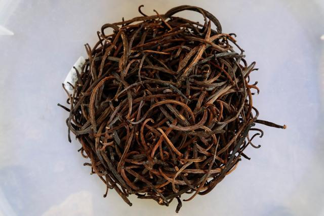 Dried vanilla beans are pictured inside a basket at Kebon Kakek farm in Serang, Banten province, Indonesia, July 25, 2020. (REUTERS/Willy Kurniawan)