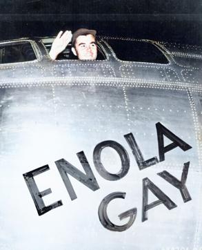 In this black and white AP photo digitally colorized and published in 2020 by Anju Niwata and Hidenori Watanave, Col. Paul W. Tibbets, Jr., pilot of the Enola Gay, the plane that dropped the atomic bomb on Hiroshima, Japan, waves from his cockpit before takeoff from Tinian Island in Northern Marianas, Aug. 6, 1945. (AP) In this black and white AP photo digitally colorized and published in 2020 by Anju Niwata and Hidenori Watanave, Col. Paul W. Tibbets, Jr., pilot of the Enola Gay, the plane that dropped the atomic bomb on Hiroshima, Japan, waves from his cockpit before takeoff from Tinian Island in Northern Marianas, Aug. 6, 1945. (AP)