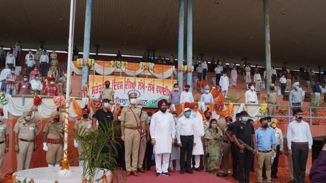 This photo provided by the district public relations office shows the minister attending the function without a mask. (HT Photo) This photo provided by the district public relations office shows the minister attending the function without a mask. (HT Photo)
