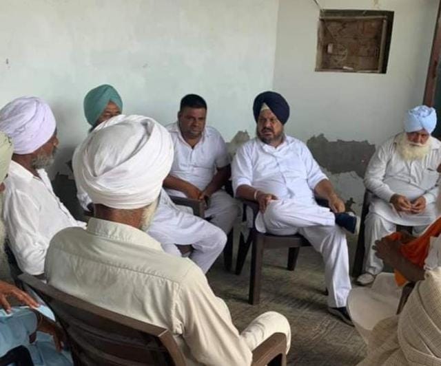 Kanwarjit Singh Rozy Barkandi seen interacting with supporters in Muktsar on August 7. The leader was spotted without a mask and so were several party workers. Kanwarjit Singh Rozy Barkandi seen interacting with supporters in Muktsar on August 7. The leader was spotted without a mask and so were several party workers.