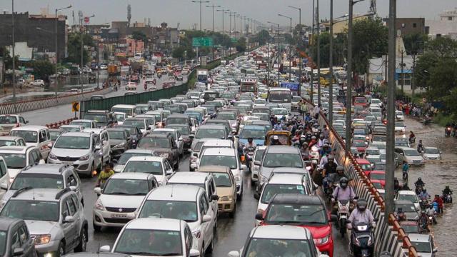 Vehicles stuck in a heavy traffic jam on waterlogged Delhi-Gurgaon Expressway. (PTI) Vehicles stuck in a heavy traffic jam on waterlogged Delhi-Gurgaon Expressway. (PTI)
