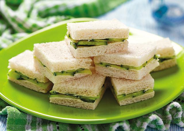 Cold cucumber sandwiches came with a slathering of kothmir chutney (Shutterstock) Cold cucumber sandwiches came with a slathering of kothmir chutney (Shutterstock)