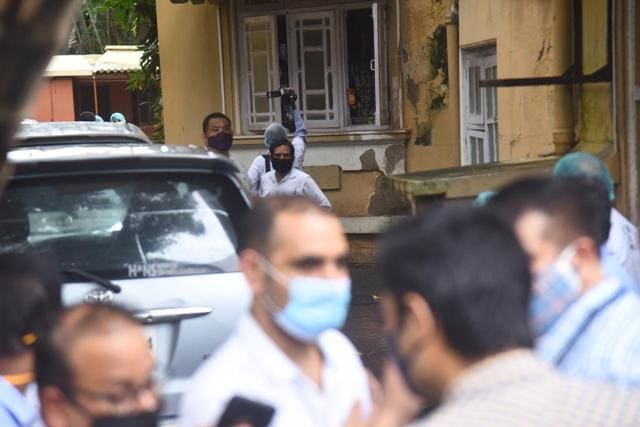 A team conducts forensic analysis outside Sushant Singh Rajput’s building. (Varinder Chawla)
