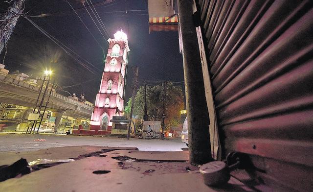 Shutters down at the Clock Tower market post 7pm on Friday night. (Gurpreet SIngh/HT)