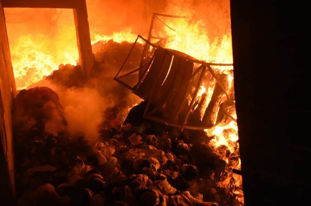The firefighters said that a lot of cotton and polyester were stocked in the building, which had a single entry and was located in a narrow street, due to which they had trouble dousing the flames. (HT PHOTO) The firefighters said that a lot of cotton and polyester were stocked in the building, which had a single entry and was located in a narrow street, due to which they had trouble dousing the flames. (HT PHOTO)