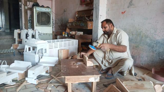 A toy maker at work. (HT photo) A toy maker at work. (HT photo)