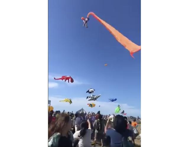 In this image made from video, a 3 year old girl is lifted into the air by a large kite during a kite festival in Hsinchu, northern Taiwan. (AP) In this image made from video, a 3 year old girl is lifted into the air by a large kite during a kite festival in Hsinchu, northern Taiwan. (AP)