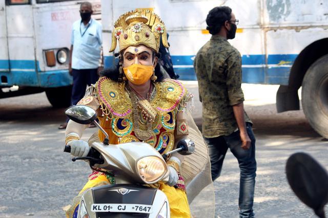 Thiruvananthapuram, India – August 30, 2020: A man dressed as King Mahabali at Chalai Market on the eve of Onam festival in Thiruvananthapuram, Kerala, India, on Sunday, August 30, 2020. (Vivek R Nair/ Hindustan Times) Thiruvananthapuram, India – August 30, 2020: A man dressed as King Mahabali at Chalai Market on the eve of Onam festival in Thiruvananthapuram, Kerala, India, on Sunday, August 30, 2020. (Vivek R Nair/ Hindustan Times)