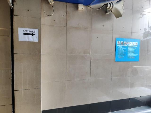 Exit sign at a metro stations as only limited gates will be opened. (Soumya Pillai/HT Photo )
