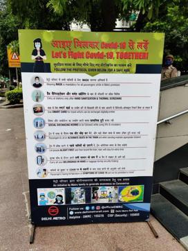 A Covid-19 advisory outside a metro station. (Soumya Pillai/HT Photo )