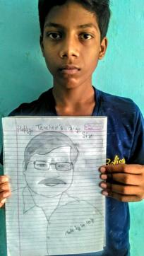 A student showing a sketch made for his teacher. A student showing a sketch made for his teacher.