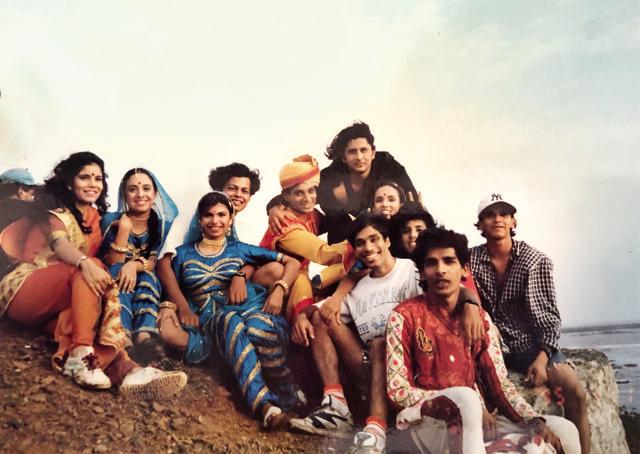 The actor with the crew of a music video
