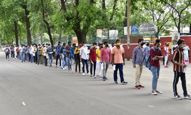 A long queue of candidates formed outside a centre in Sector 36, Chandigarh, where the UPSC National Defence Academy examination was conducted on Sunday. (Ravi Kumar/HT)