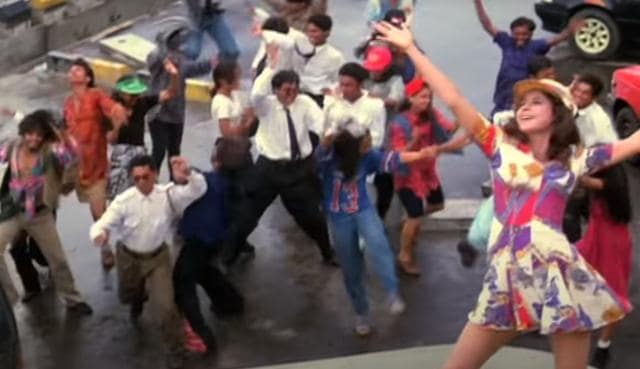 Urmila Matondkar in the iconic printed dress from the title song of the film, Rangeela. (YouTube) Urmila Matondkar in the iconic printed dress from the title song of the film, Rangeela. (YouTube)