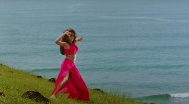 Urmila Matondkar in hot pink co-ords for a song in Rangeela. (Eros Now/YouTube) Urmila Matondkar in hot pink co-ords for a song in Rangeela. (Eros Now/YouTube)