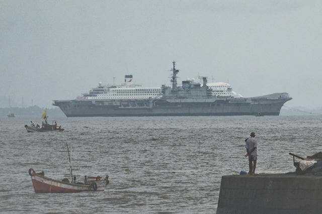 Indian Navys decommissioned warship aircraft carrier INS Viraat is towed away by boats while ships final journey to the Alang Ship breaking yard in Gujarat, from the naval dockyard in Mumbai. (Pratik Chorge/HT Photo) Indian Navys decommissioned warship aircraft carrier INS Viraat is towed away by boats while ships final journey to the Alang Ship breaking yard in Gujarat, from the naval dockyard in Mumbai. (Pratik Chorge/HT Photo)