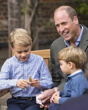 In the image Prince George holds the tooth of a giant shark. (AP) In the image Prince George holds the tooth of a giant shark. (AP)